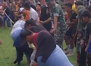 Babinsa Koramil 1305-02/Tolitoli Utara Bersama Pemerintah Desa Mengelar Lomba Tarik Tambang