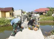 TMMD 118 Kodim 1305/BT : Perindah Jembatan Dengan Warna