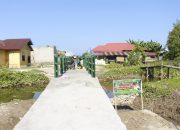 Warnai Sasaran Jembatan TMMD 118 Kodim 1305/BT Berbalut TNI