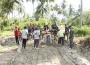 Bermodalkan Pacul dan Skop, Satgas TMMD 118 Optimis Jalan Kantong Produksi Selesai Tepat Waktu