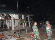 Berikan Semangat, Malam Hari Dansatgas TMMD 118 Datang di Lokasi Sasaran