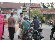 Polsek Biau bersama anggota dan Bhayangkari berbagi takjil dibulan ramadhan