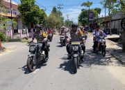Personel Polsek Baolan Kawal Pemakaman Putra Pendiri Kabupaten Tolitoli, Alm. Sahman Hi Mallu